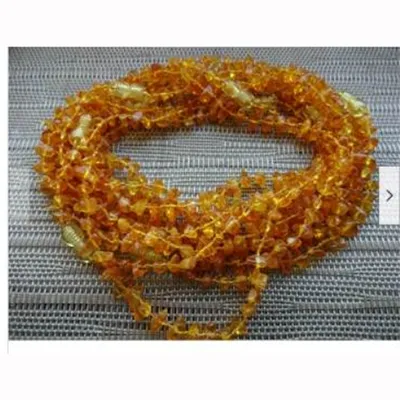 Collier de dentition jaune ambre, destiné aux bébés, 38 cm de long. Produit vendu en ligne, notamment via eBay (Numéro d'identification: 225131737342).