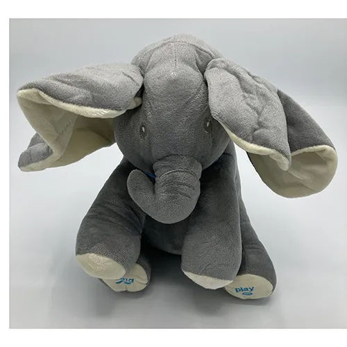 Jouet à piles en forme d'éléphant avec effets sonores.