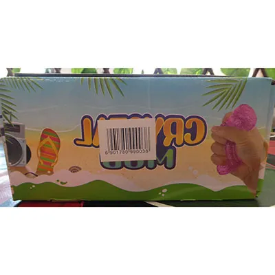 Slime multicolore dans un récipient en plastique transparent avec un capuchon en forme de chat.