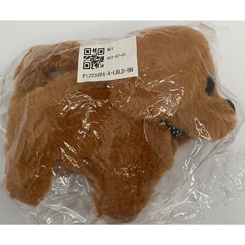 Puppy peluche marron à piles, environ 30x40 cm. Produit vendu en ligne.