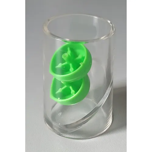 Wind-up plastic toy, in the shape of a green deer and  a yellow mouse.