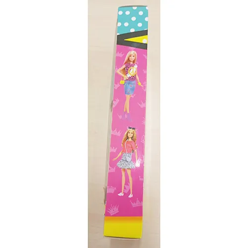 Plastic doll, with long braided hair and a colourful sleeveless dress. Size: 28 cm.