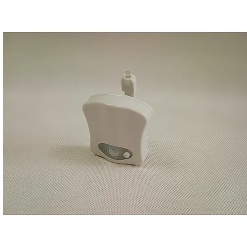 Lampe blanche de cuvette de toilette LED à piles. Produit vendu en ligne, notamment via www.cool-mania.eu.