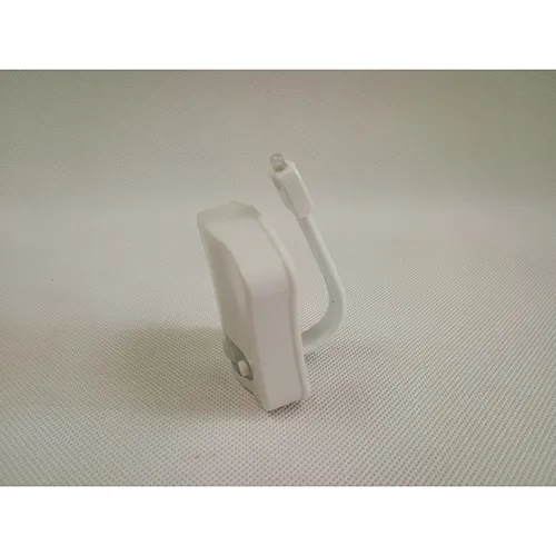 Lampe blanche de cuvette de toilette LED à piles. Produit vendu en ligne, notamment via www.cool-mania.eu.