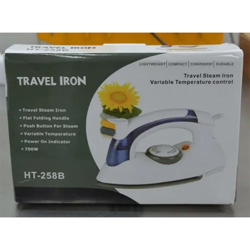 Fer à repasser avec prise murale attachée.