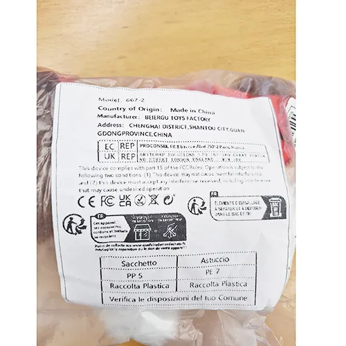 Jouet en peluche électronique en forme de chiot avec un ruban rouge et un collier avec cloche. Produit vendu en ligne, notamment via Shein (identifiant unique: sl2311262284392222).