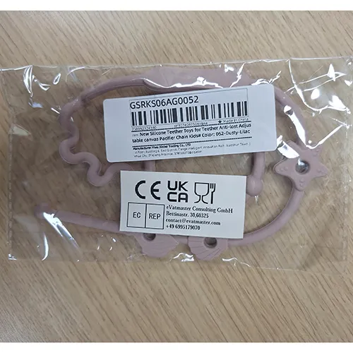 Porte-sucette rose, en silicone. Produit vendu en ligne, notamment via AliExpress (identifiant unique: 1005006996585071).