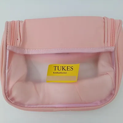 Sac cosmétique rose avec une fenêtre transparente. Produit vendu en ligne, notamment via Temu (identifiant du produit: 601100048460191).