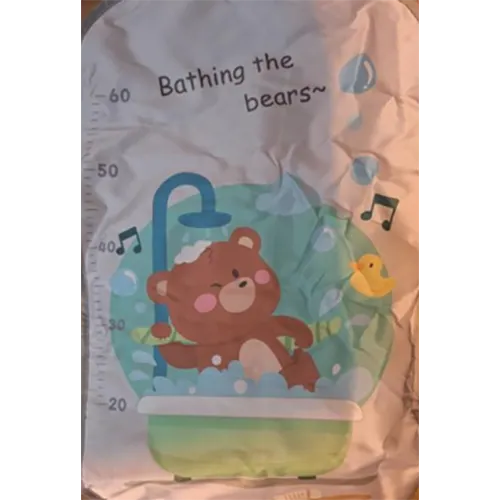 Tapis de jeu pour enfants contenant plusieurs boutons et autres accessoires de stimulation.