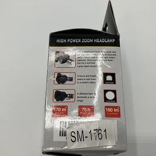 Lampe frontale en plastique dur noir avec une sangle textile. Produit vendu en ligne, notamment via Garderoben.se.