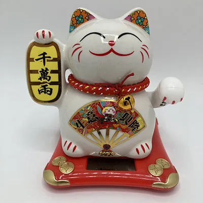 Chat de décoration avec fonction d'agitation, alimenté par une cellule solaire.