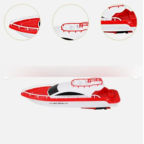 Jouet de bain en forme de bateau en plastique rouge et blanc avec deux moteurs à hélice nécessitant une batterie chacun. Produit vendu en ligne, notamment via eBay (identifiant unique: 127095230458).