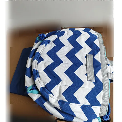 Balançoire textile bleu-blanc pour les enfants de moins de trois ans. Produit vendu en ligne, notamment via Amazon (ASIN: B0D3HM6TDV).