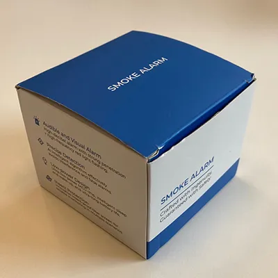 Détecteur de fumée rond blanc et noir. Produit vendu en ligne, notamment via Shein (identifiant unique du produit: sr25090201121913177).