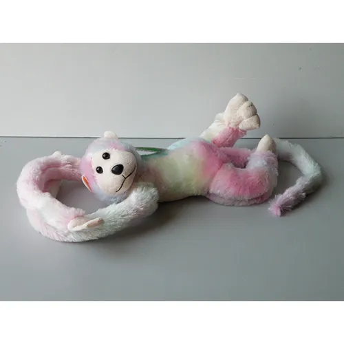 Singe en peluche de couleur arc-en-ciel, émettant un son, avec les mains velcro, les yeux en plastique et le nez.