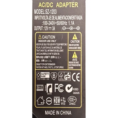 Unité d'alimentation AC/DC de classe II avec cordon d'alimentation détachable et sortie DC accessible.