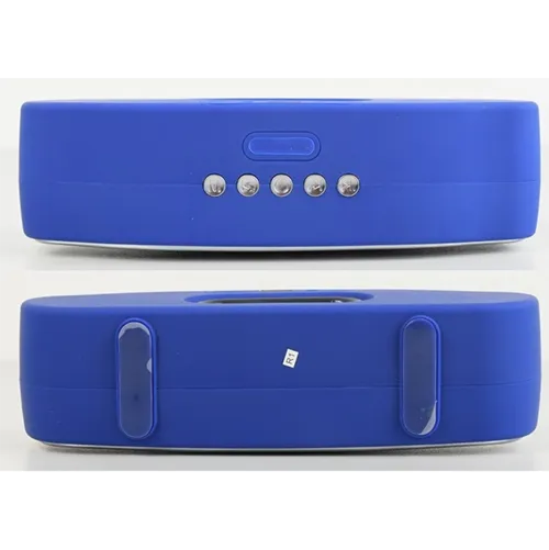 Haut-parleur sans fil avec boîtier en plastique et batterie rechargeable intégrée.