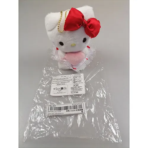 Porte-clés avec un jouet doux. Dimensions environ largeur 9 cm, longueur 17 cm, épaisseur 6 cm.