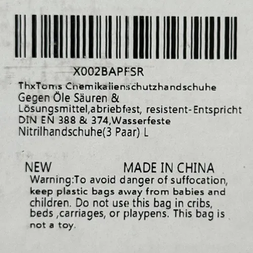 Gants de protection en nitrile vert, annoncés comme résistants aux produits chimiques.